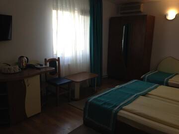 Фото номера Трехместный номер Гостевой дом Marina House г. Сулина 6