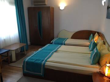 Фото номера Трехместный номер Гостевой дом Marina House г. Сулина 7