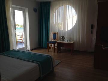 Фото номера Люкс с балконом Гостевой дом Marina House г. Сулина 7